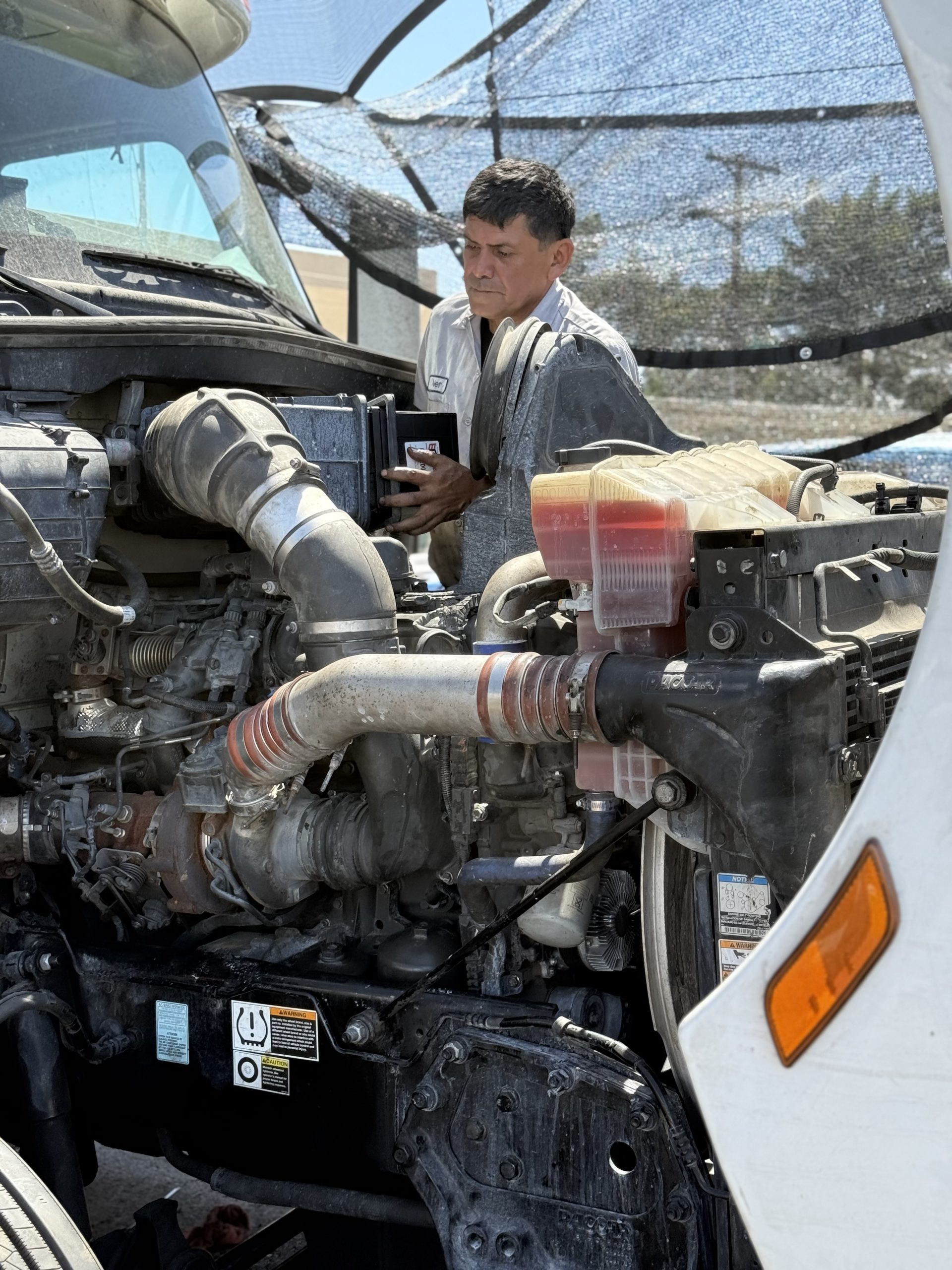 technician-performing-mobile-truck-diagnostics